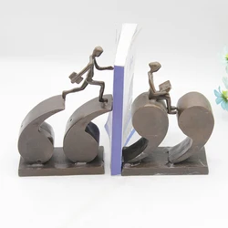 Metal antique bronze rock climbing statues