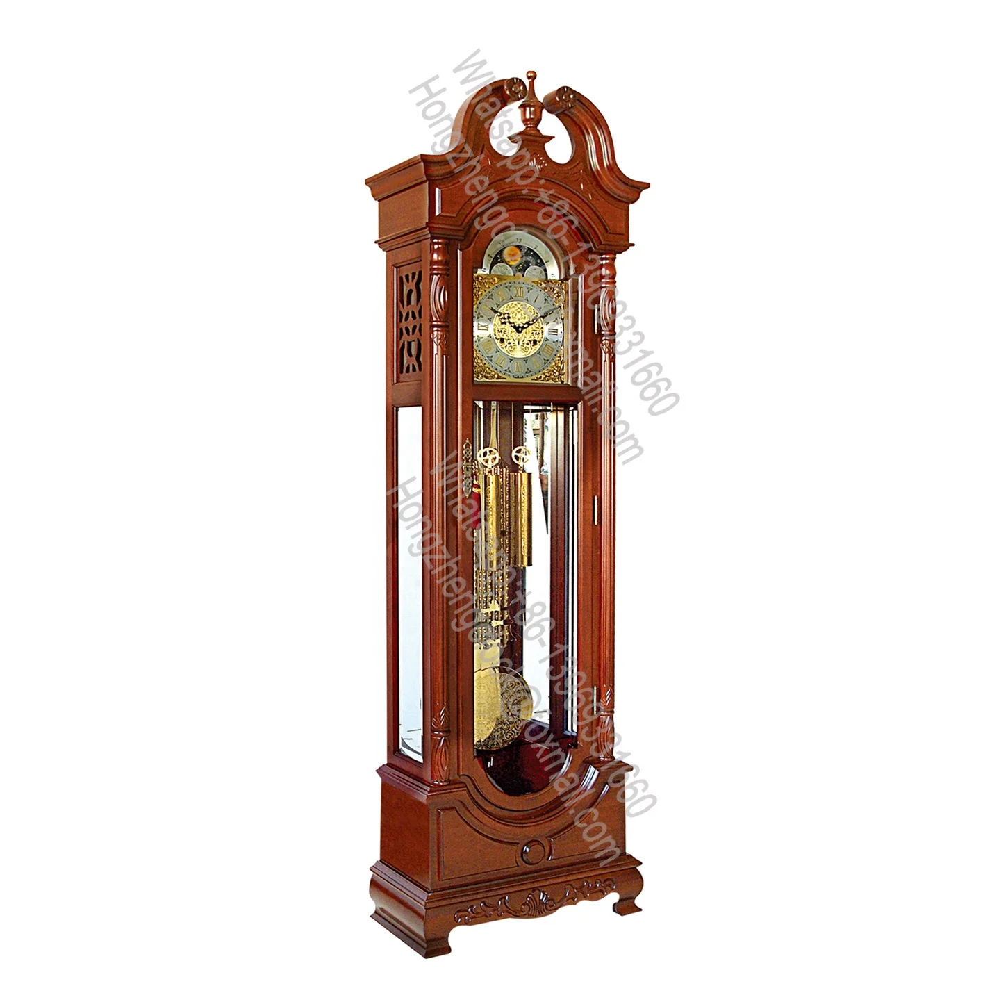Polished-brass pendulum mirrors the dial polished brass weight shells with decorative bands Grandfather Clock