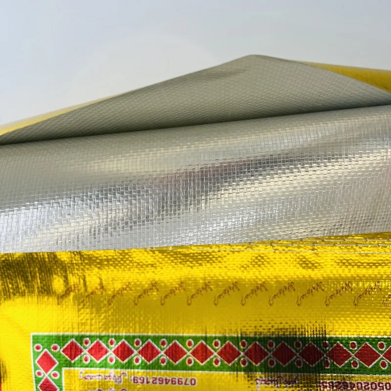 China Manufacturer Silver rice bag 25kg 50kg plastic rice bag with handle