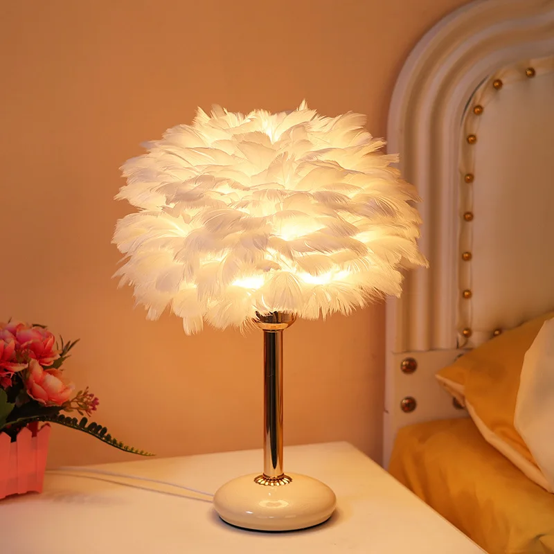 Nordic creative girl dream ceramic lamp warm feather bedside lamp table lamp bedroom, one piece generation