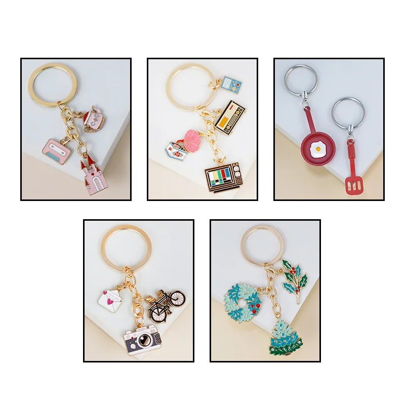 New stylish alloy keychain camera TV castle pot fried eggs Christmas tree bicycle pendant bag decorative car pendant gift