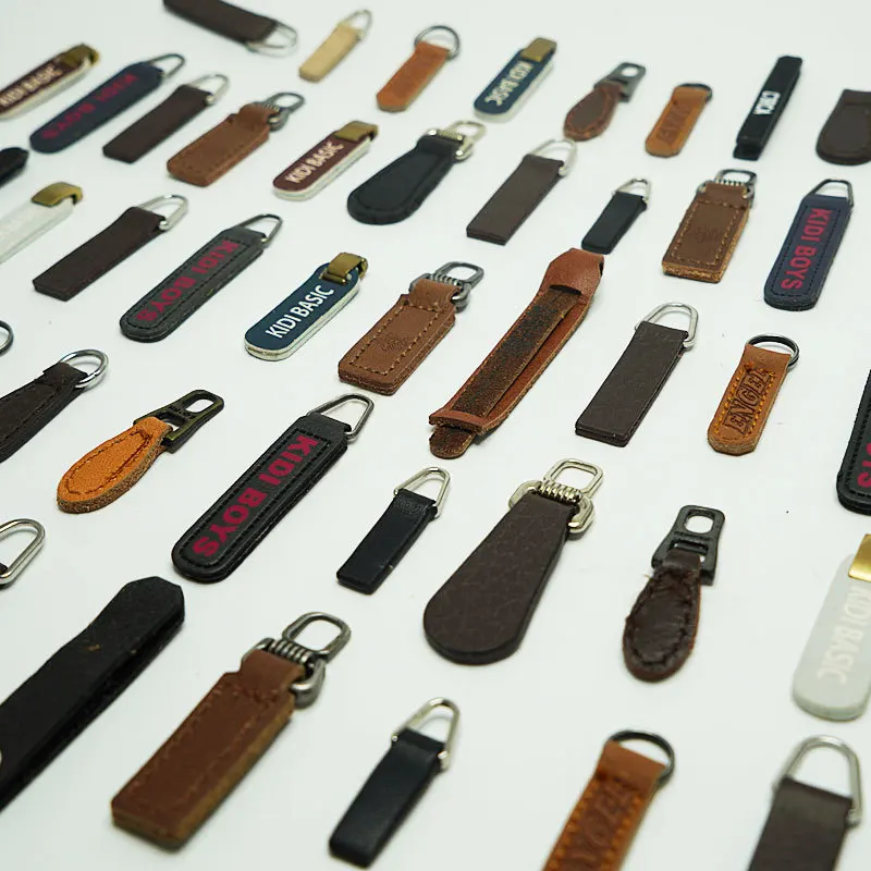 Custom logo PU Leather Zipper Pulls Zipper Tags Fixer Wholesale Garment Accessories Durable Boot Zipper Heads for Bags Jacket