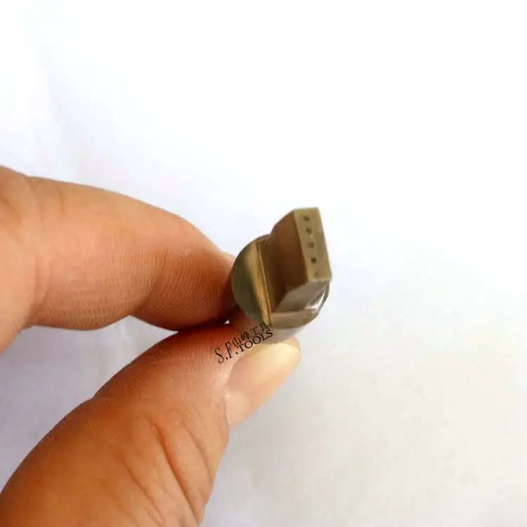 Multi-point diamond trimmer for grinder wheels