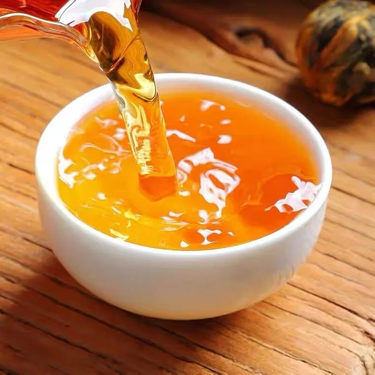 Wholesale Yunnan Fengqing Dian Kung Fu Tea Blooming Black Tea Golden Buds Honey Aroma Slimming featuring Chrysanthemum Tea