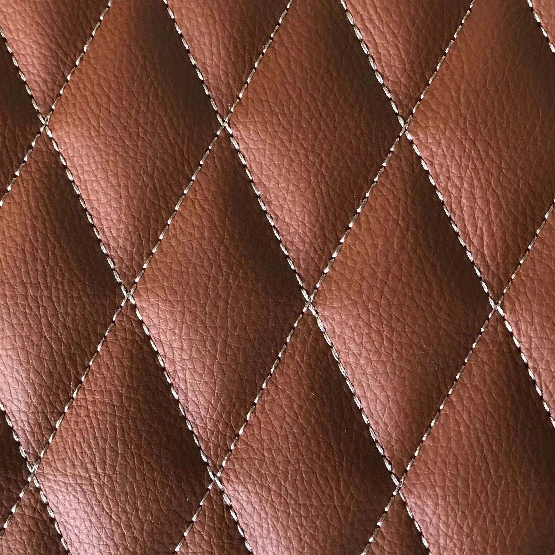 
Sponge leather sewing with embroidery quilted design processing price only 