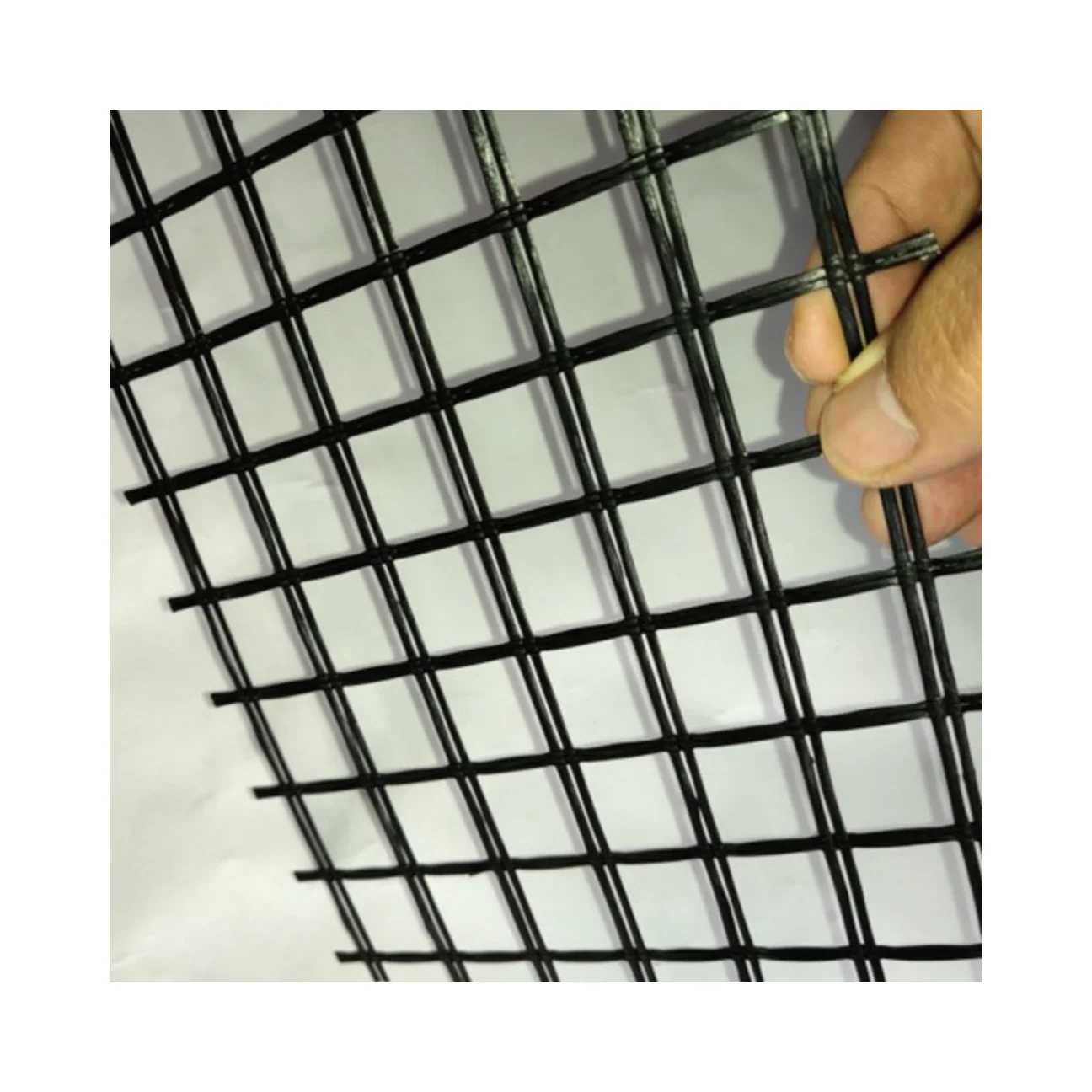 High Tensile Strength Bitumen Coated Composite Nonwoven  Fiberglass Geogrid  for Asphalt Overlayer Reinforcement Gravel