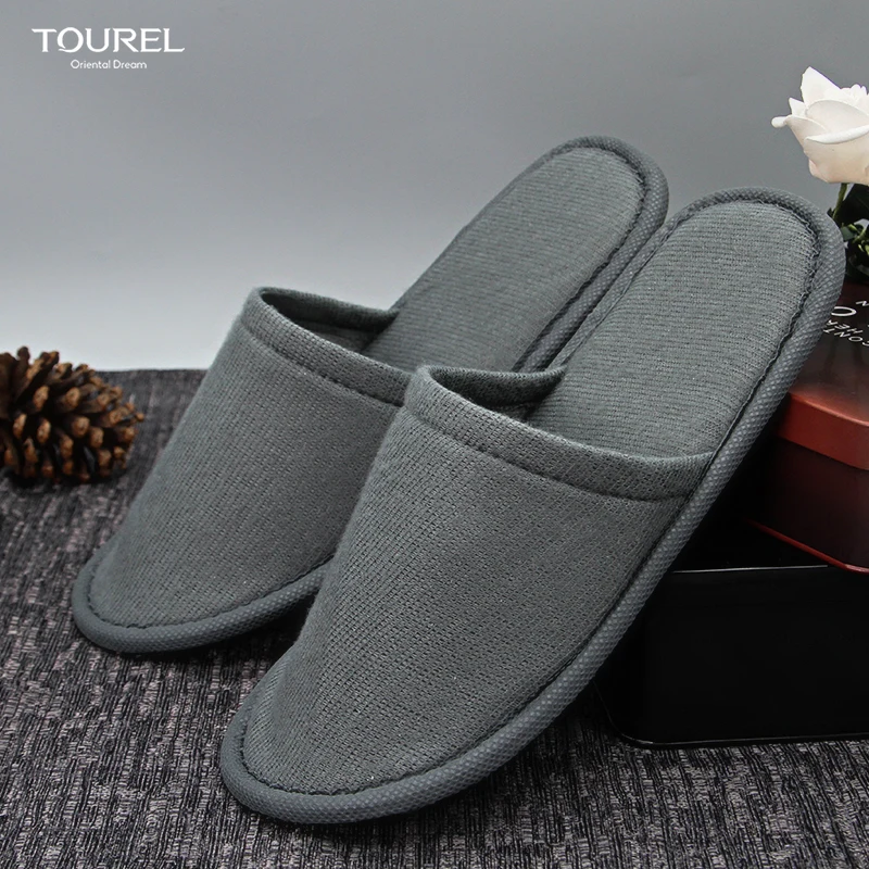 OEM Custom Logo luxury hotel room amenities slippers manufacturer modern design plain nap cloth shoes disposable spa slippers