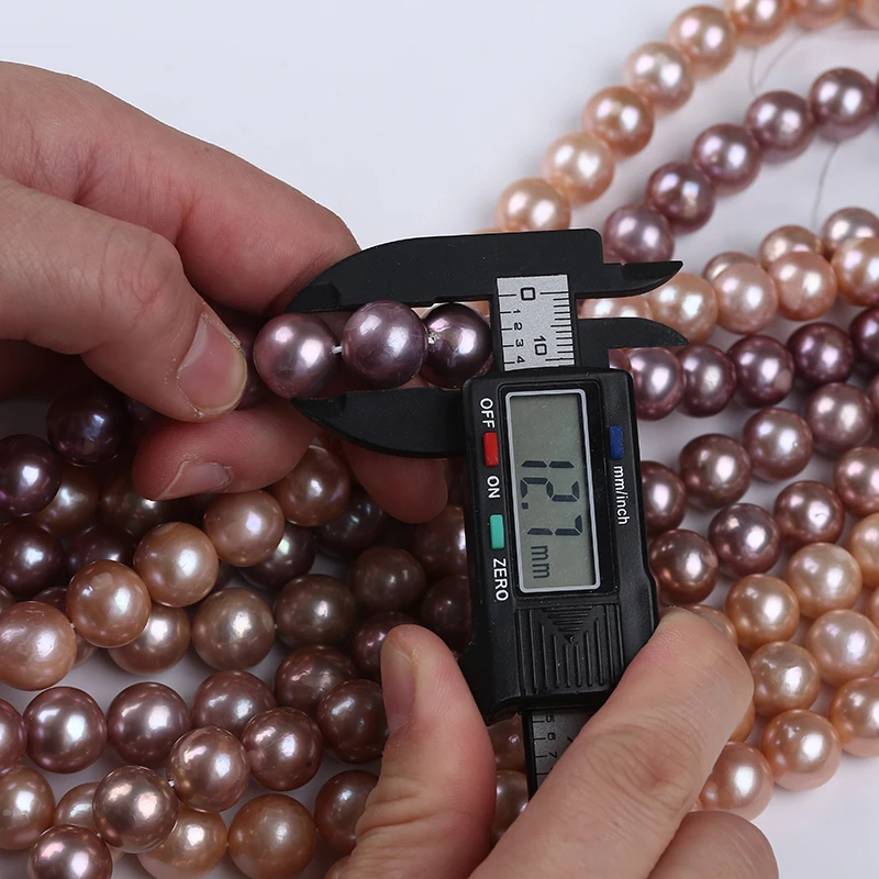 cheap price 11-14mm AAA natural pink purple loose real freshwater edison pearls beads strand