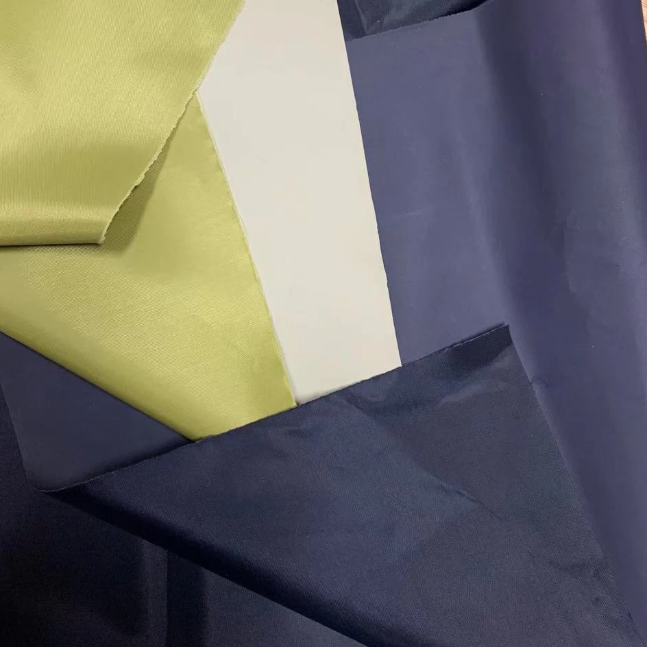 High Quality 100% Polyester 190T Taffeta Solid Dyed PVC Coating Fabric with WR for Raincoat and Poncho