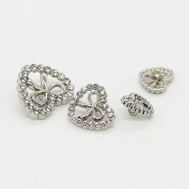 Source manufacturers fashion decorative buckle accessories diy Love bow hollow drill metal buttons