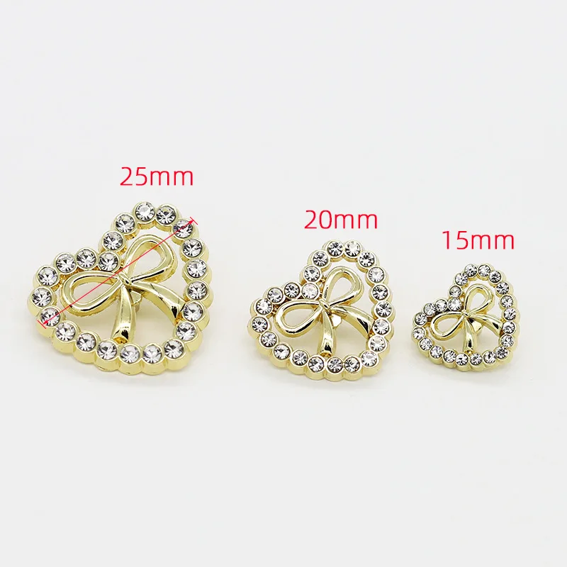 Source manufacturers fashion decorative buckle accessories diy Love bow hollow drill metal buttons