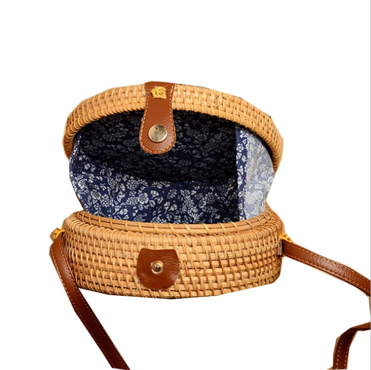 
Vietnam rattan bag handmade straw bag with blue broken flower lining and hollow flower making holiday bag with diameter of 18cm 