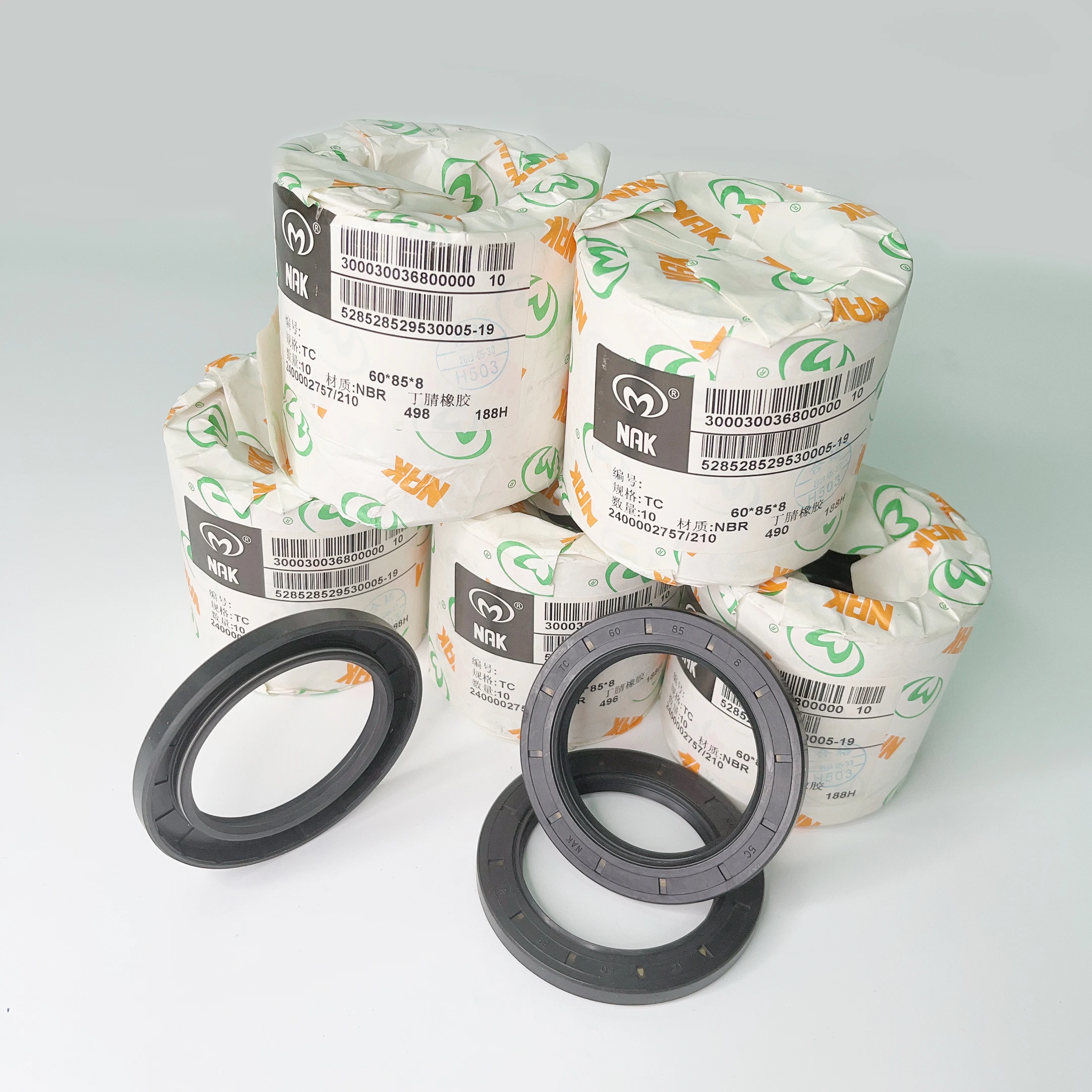 CAIMI qualified manufacturer pos gearbox FKM+spring rotary shaft oil seal NAK