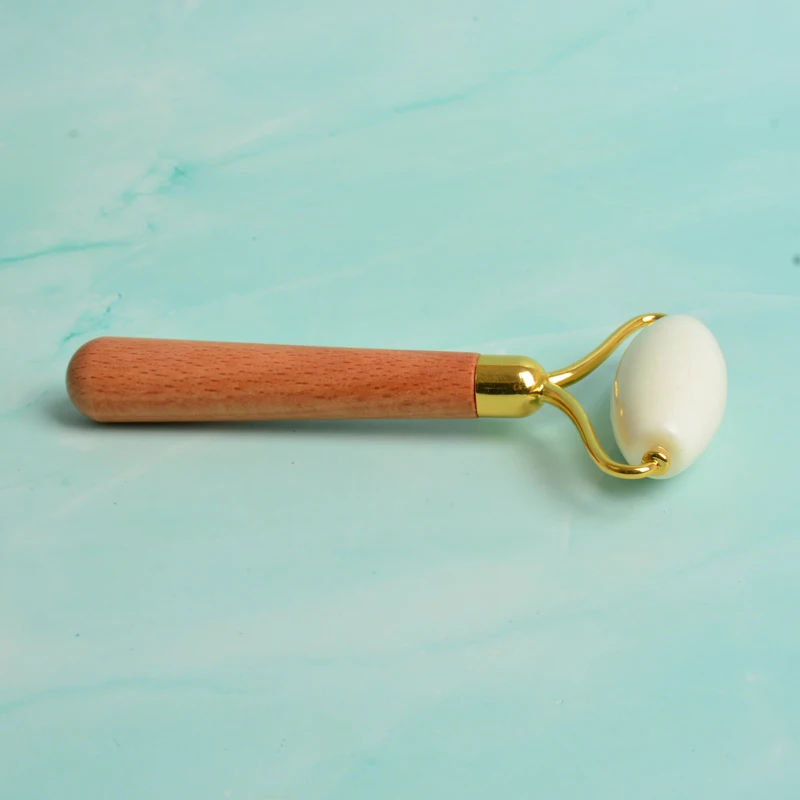 
White massager facial stone roller jade guasha 