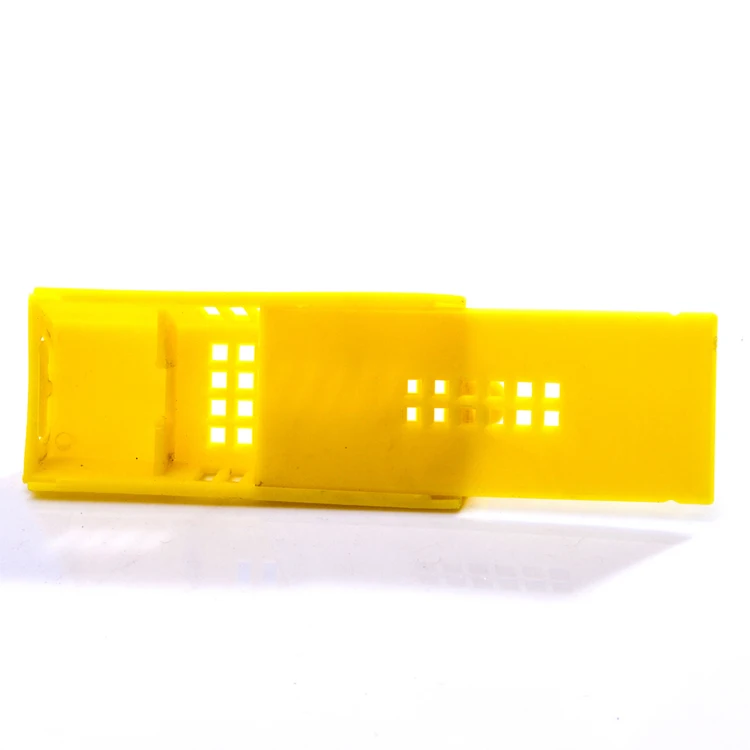 Yellow plastic bee queen cage for beekeeping equipment