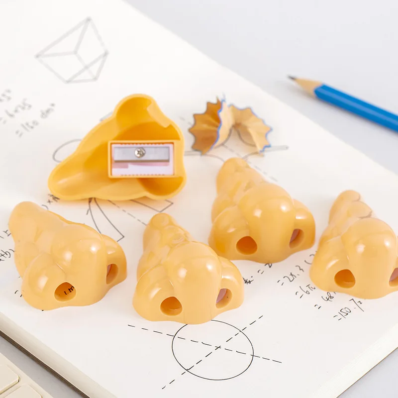 Novelty shape single hole plastic funny nose pencil sharpener for school