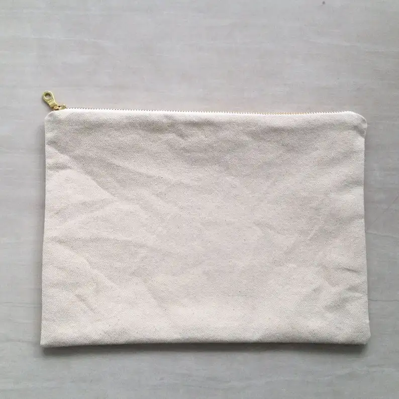 
Canvas Zipper Pouch. Choose between 5 sizes. Natural Cotton Canvas with Gold Zipper. 