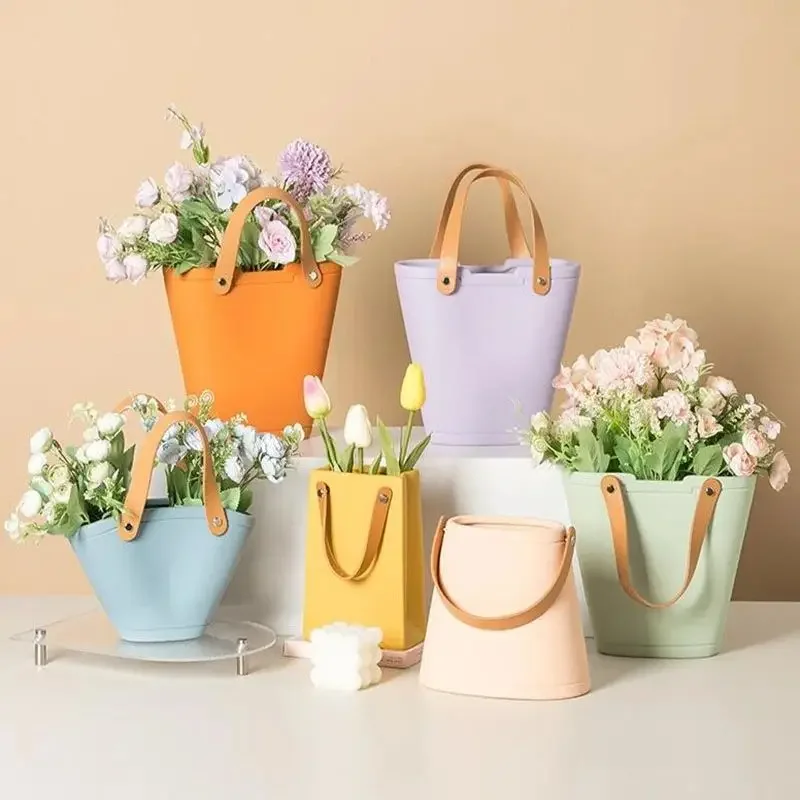 Niseven Hot Selling Creative Decorative Table Vase Modern Hand Bag Ceramic Vase For Home Decor
