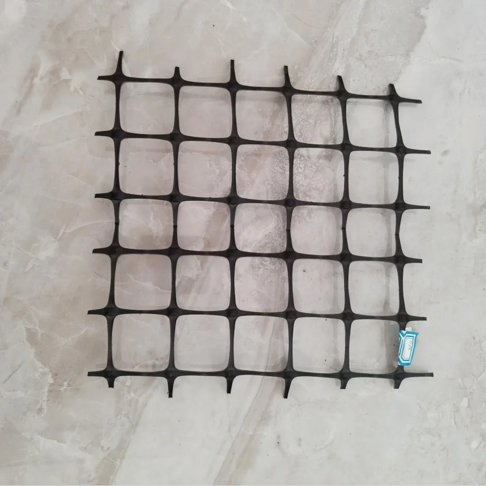 Factory Supply High Strength PP Biaxial Geogrid 20KN 30KN 40KN Plastic Building Mesh For Road Reinforcement