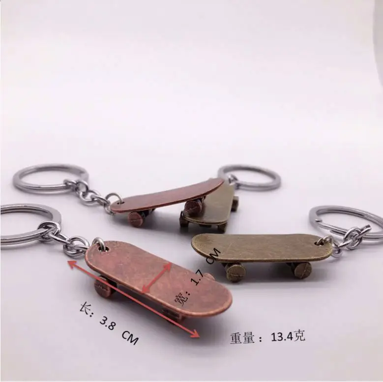 Cute Mini Skateboard Keychain Women Men Interesting Simulation Scooter Car Keychain Key Ring For Skate Lovers Souvenir Gifts