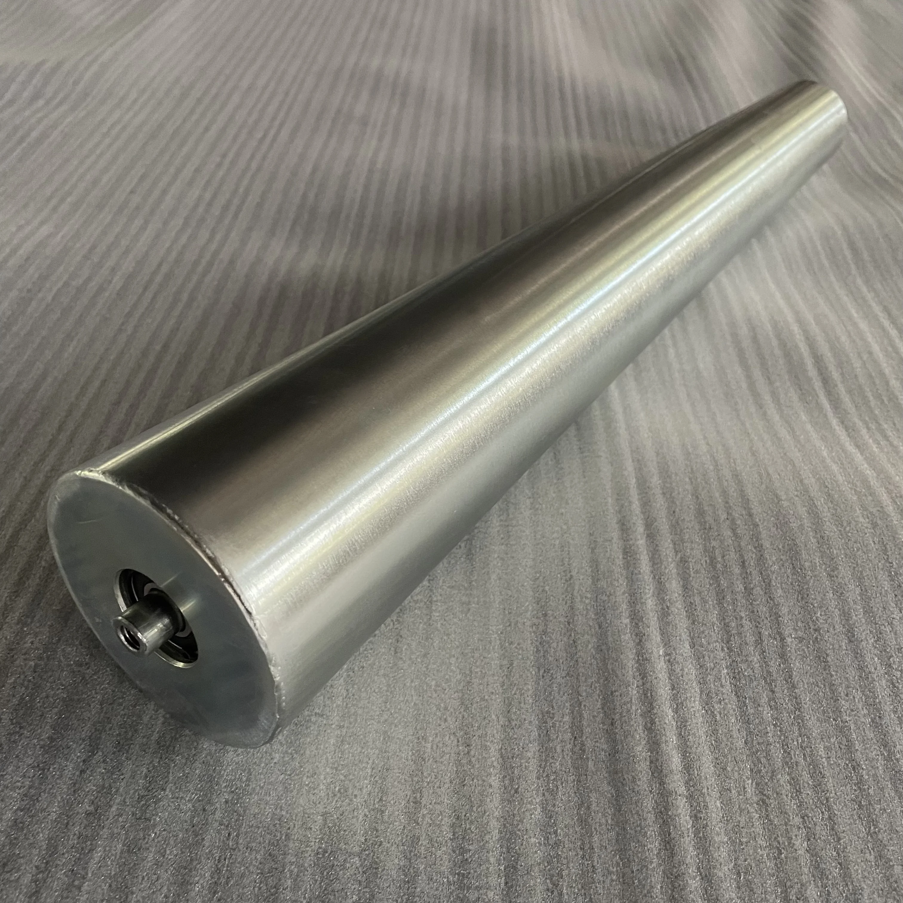 Taper low noise durable galvanized steel gravity roller