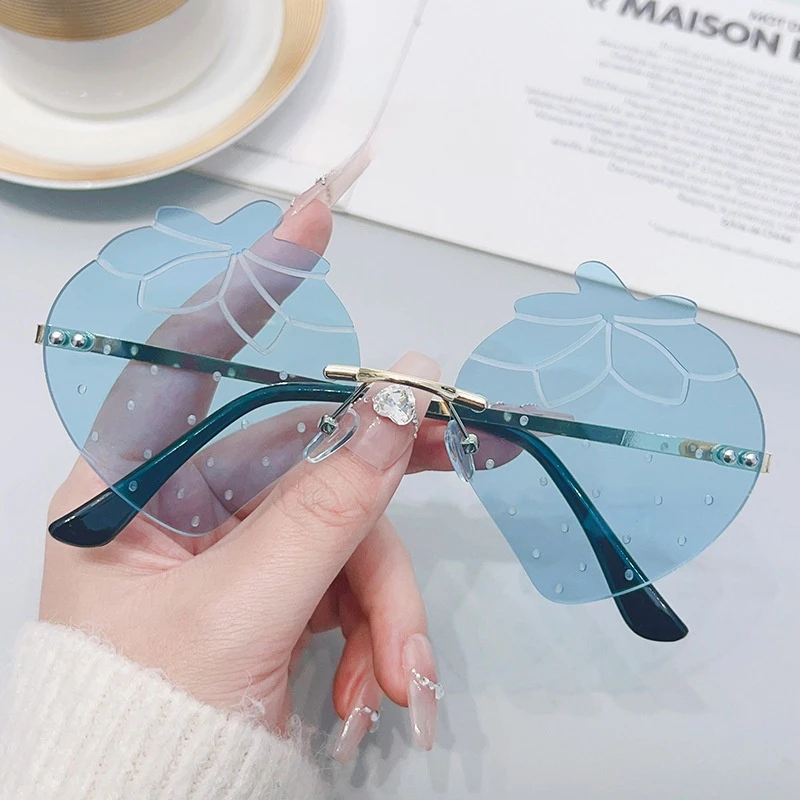 Trendy Unisex Gold Rimless Sunglasses with UV400 Red Lenses Strawberry Style Fashionable Eyewear for Parties