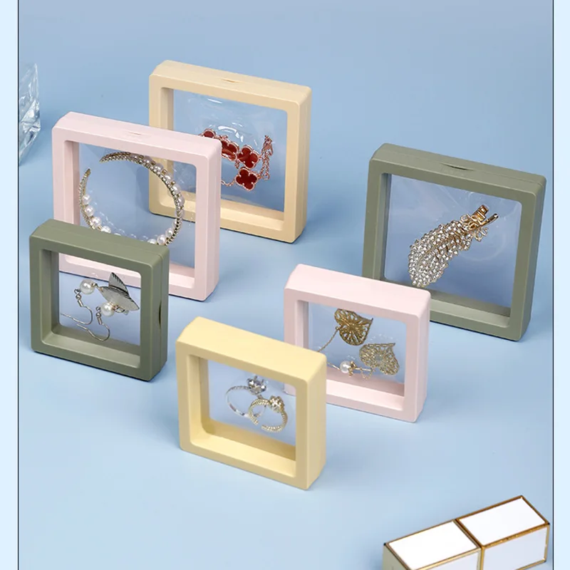 Colorful 3D packaging cases free stand plastic floating frame display gift pe film jewelry storage box