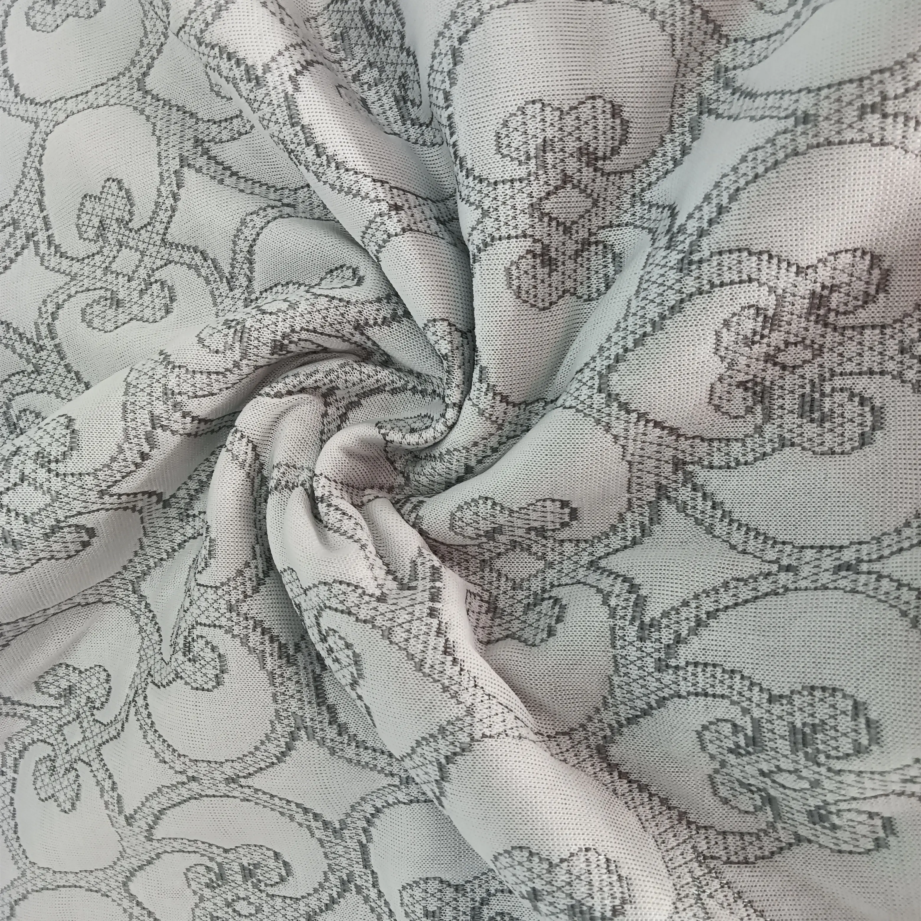 
Chinese traditional paper-cut style heart-shaped stitching pattern jacquard 180gsm gray knitted mattress fabric 