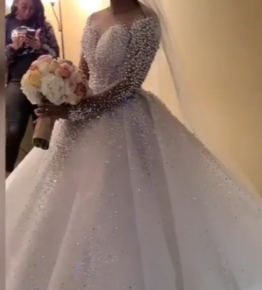 Luxury pearls ball gown wedding dress long sleeve v neck heavy pearl beaded wedding gown bridal dress