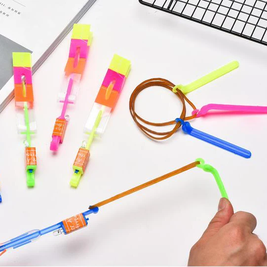 Kids Classic Toy Magic Plastic Light Glowing Rocket Slingshot Shooting Flying Led Arrow Helicopter