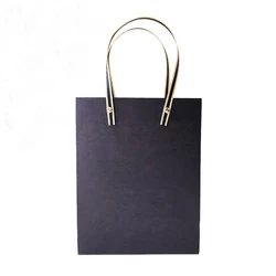 Wholesale high quality printed paper bag shopping bag with rivet and flat handle