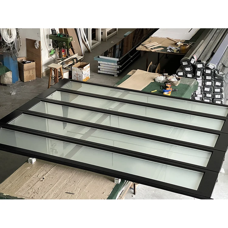 Commercial cheap aluminum alloy exterior frosted glass modern new black sectional panel garage door for homes