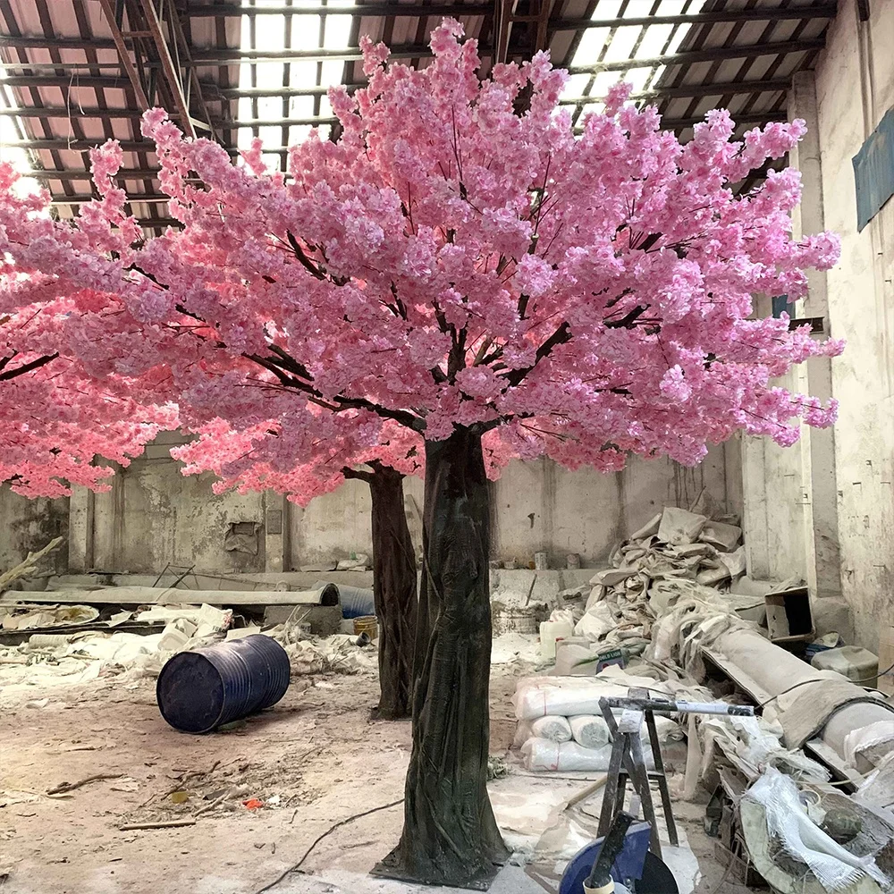 Large decorative pink artificial faux plastic sakura cherry blossom tree