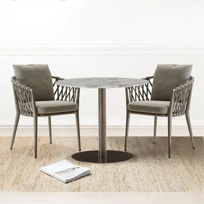 Outdoor balcony patio furniture marble stone reception table with garden chairs.Garden coffee table with chair set