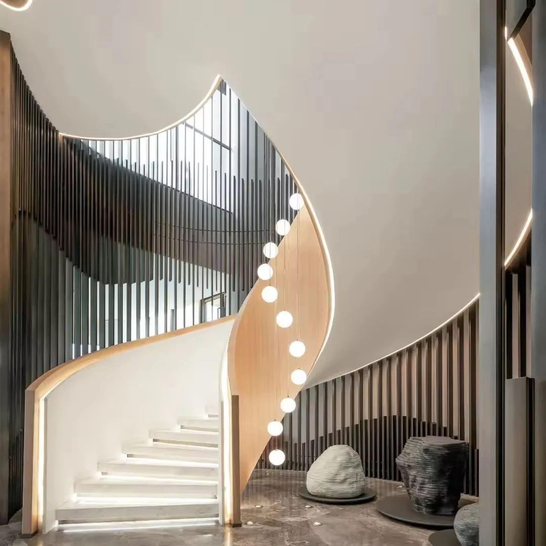 Luxury design curved stair marble/stone tread with wrought iron railing stairs from Foshan factory