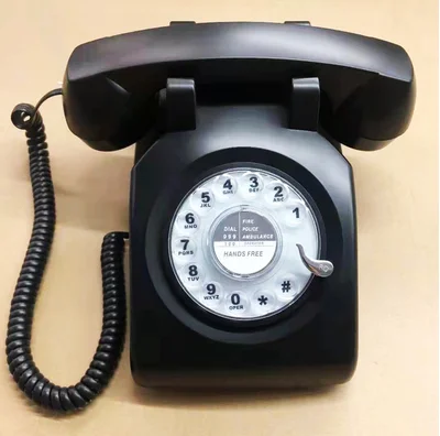 old Red vintage retro wall rotary dial telephone with classical bell