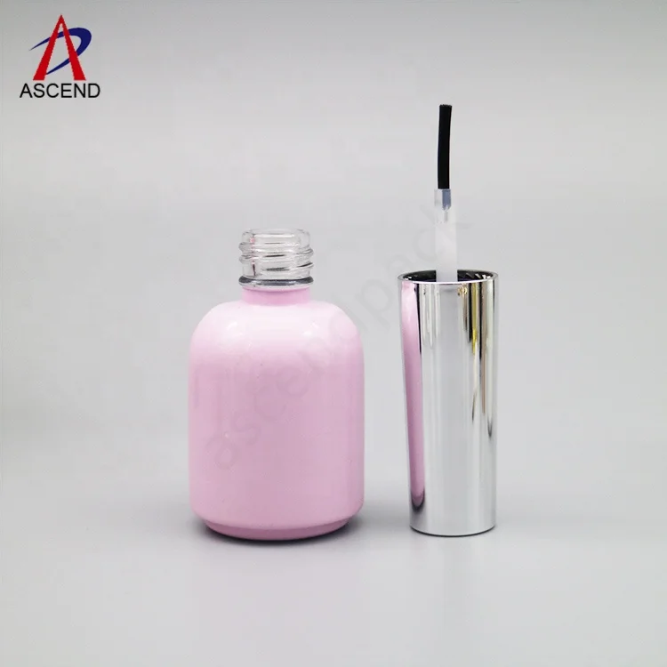 wholesale cute glossy pink color empty round shaped 10ml nail polish uv gel bottle with gel brush and long silver caps