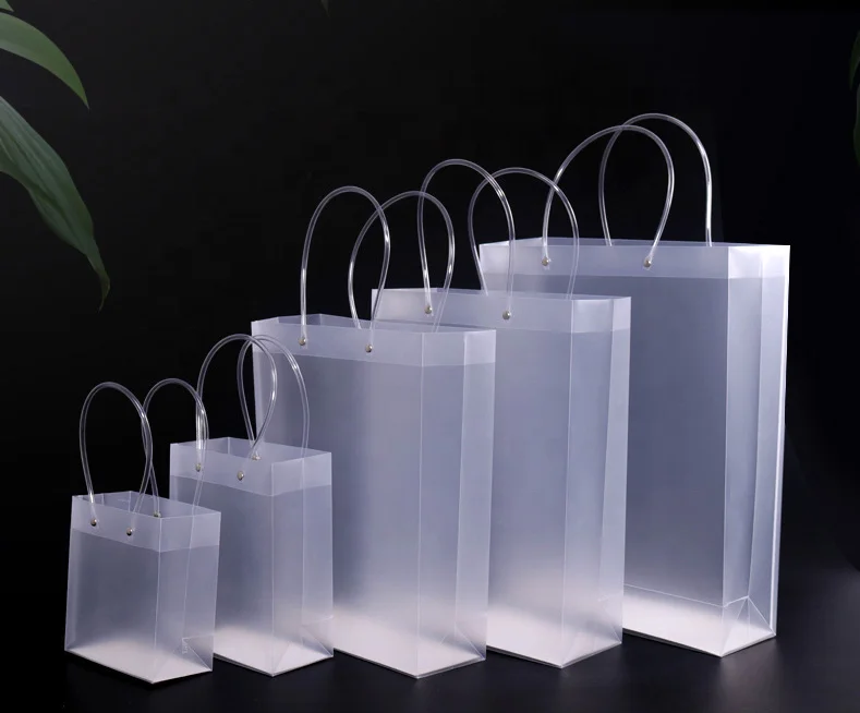 Eco-friendly wholesale transparent pvc handle shopping packaging gift bags