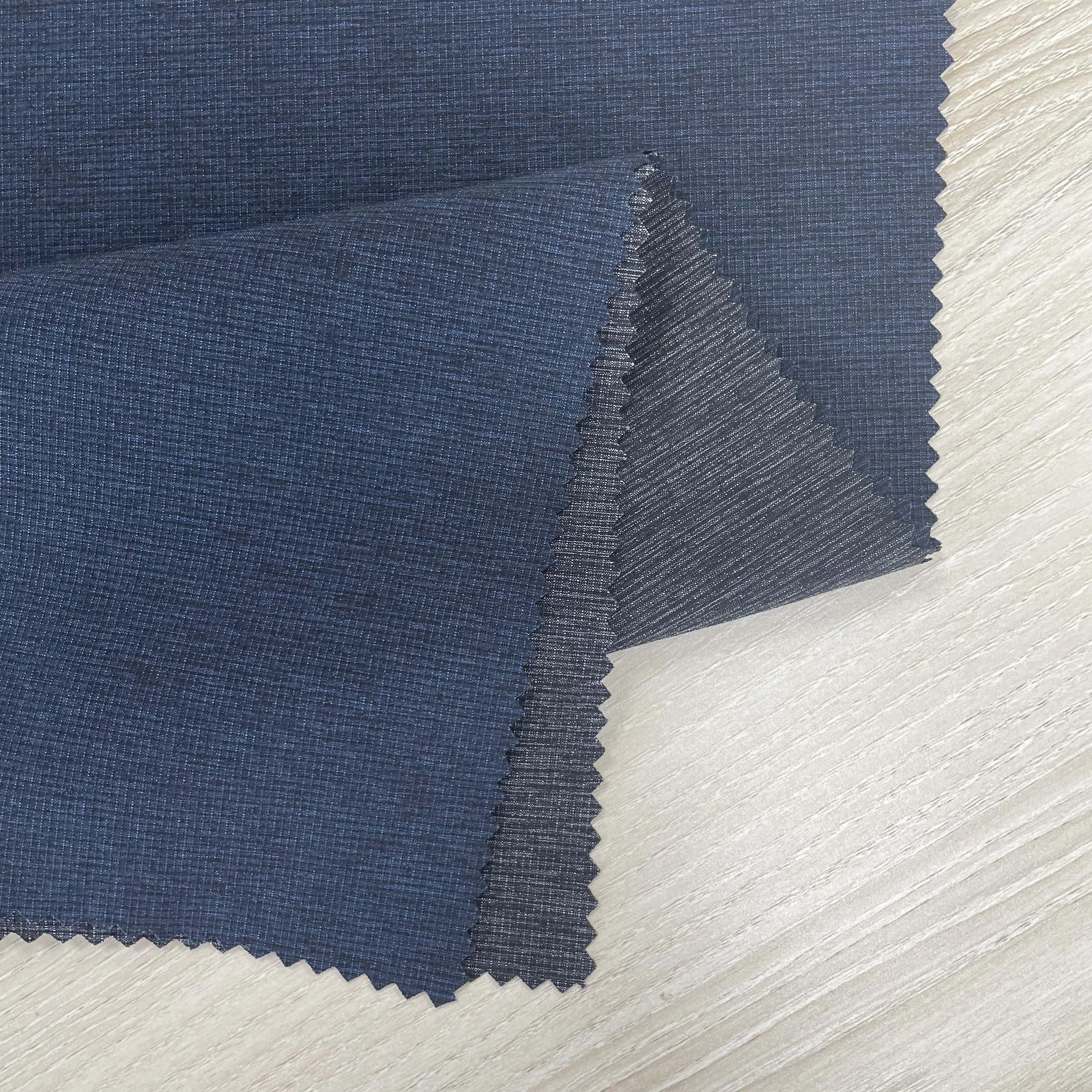 45% Nylon 45% Polyester 10% Spandex 0.15 Ribstop 4 Way Stretch Fabric