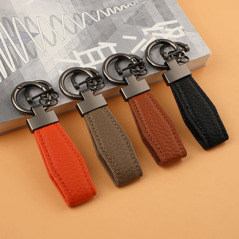 High Quality Factory Custom Wholesale Leather Car Logo Metal Embossed Keychain Zinc Alloy Keychain