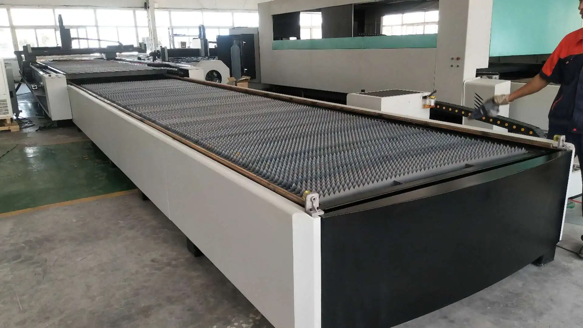 Laser iron sheet metal cutting machine with exchange tables double plate with good price