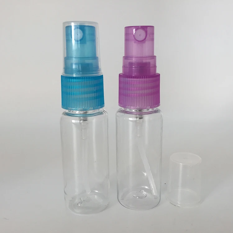 Wholesale 20ml transparent PET spray bottle with fine mist sprayer multi color lid for perfume dispenser, travel, outdoor