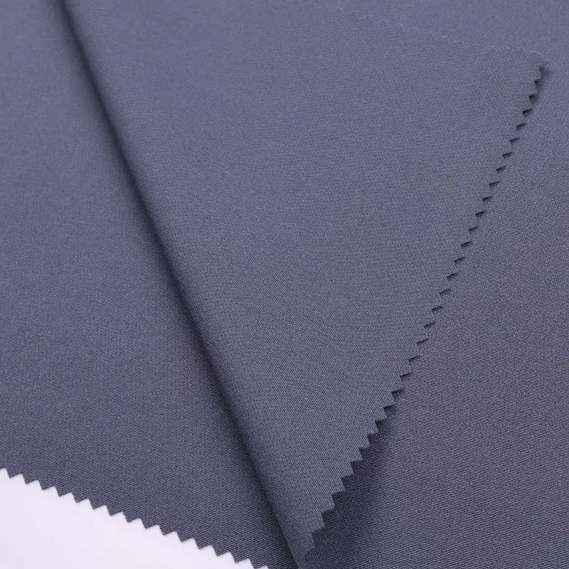 Shaoxing yuyuan imp Hot Sale Wholesale 100d 130gsm Plain Solid 4 way nsLycra Fabric Indian nsLycra Fabrics Garments ns fabric