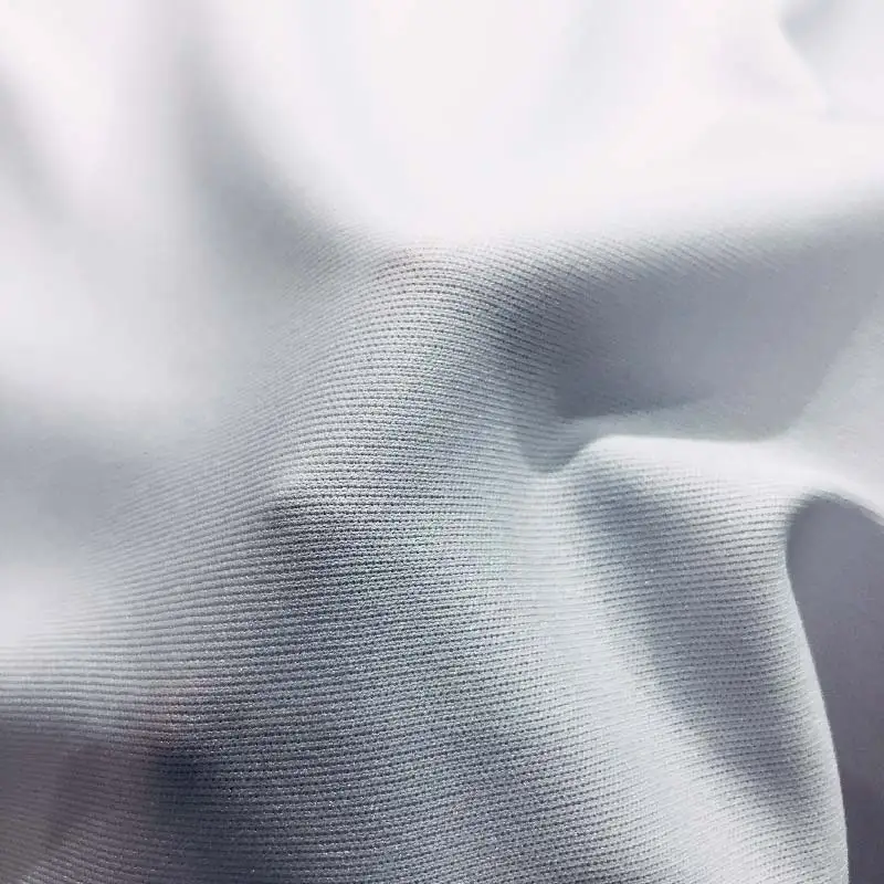 China manufacturer 100% polyester material Interlock 4 Way Stretch Sportswear Fabric for Dry Fit T-Shirt