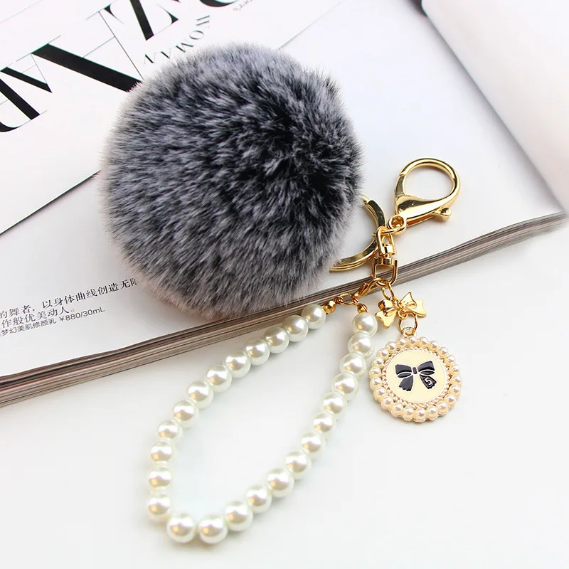 2022 Hot Sale Cheap Promotional Pearl Chain Charm Fluffy Cute 8cm Faux Fur  Key houlde Pompon Fur Ball Pom Keychain
