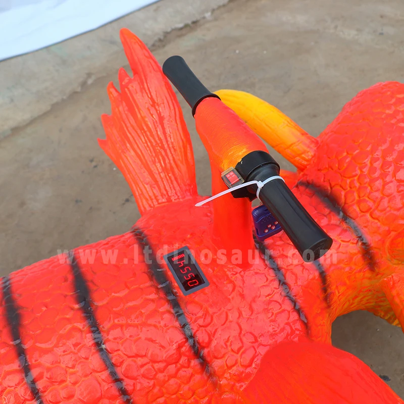 Amusement fun fair animatronic ride dragon on toy outdoor yard