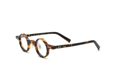 Bright solid translucent tortoise shell stitched round glasses frame