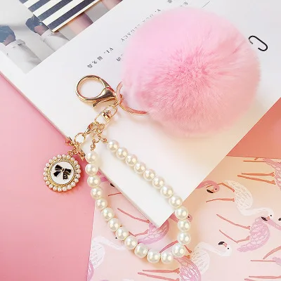 2022 Hot Sale Cheap Promotional Pearl Chain Charm Fluffy Cute 8cm Faux Fur  Key houlde Pompon Fur Ball Pom Keychain