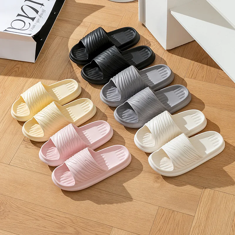 Spring and summer new thick soled slippers solid color corrugated light simple home outdoor soft sole non-slip EVA slippers