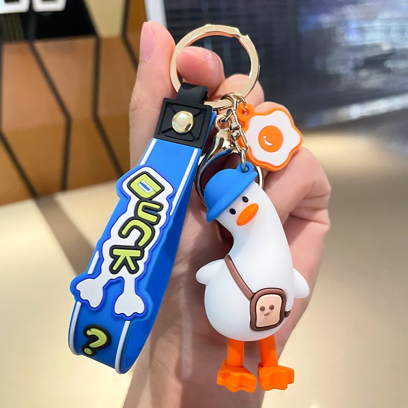 Funny tilt head duck cute anime pvc 3d keychain custom logo pvc rubber keychain Key Handbag Accessories